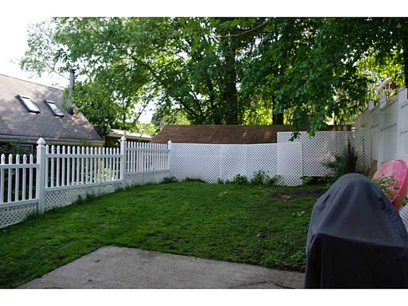 Yard/Garden. Private rear yard with new fence and new retaining wall.