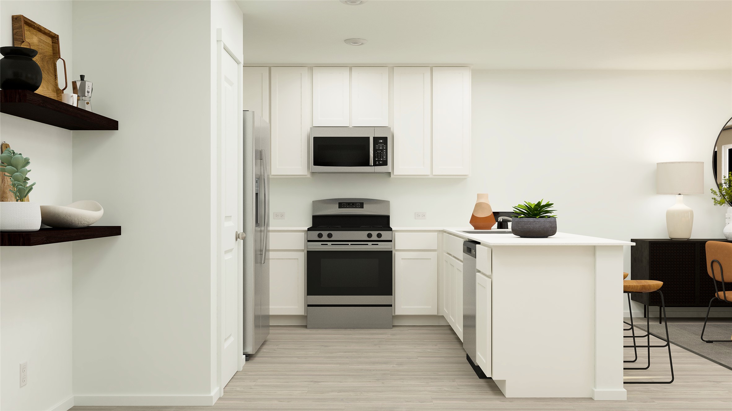425 Silvercloud Drive Lockhart, TX 78644 - Photo 21 of 30 a kitchen with stainless steel appliances a stove microwave and a refrigerator