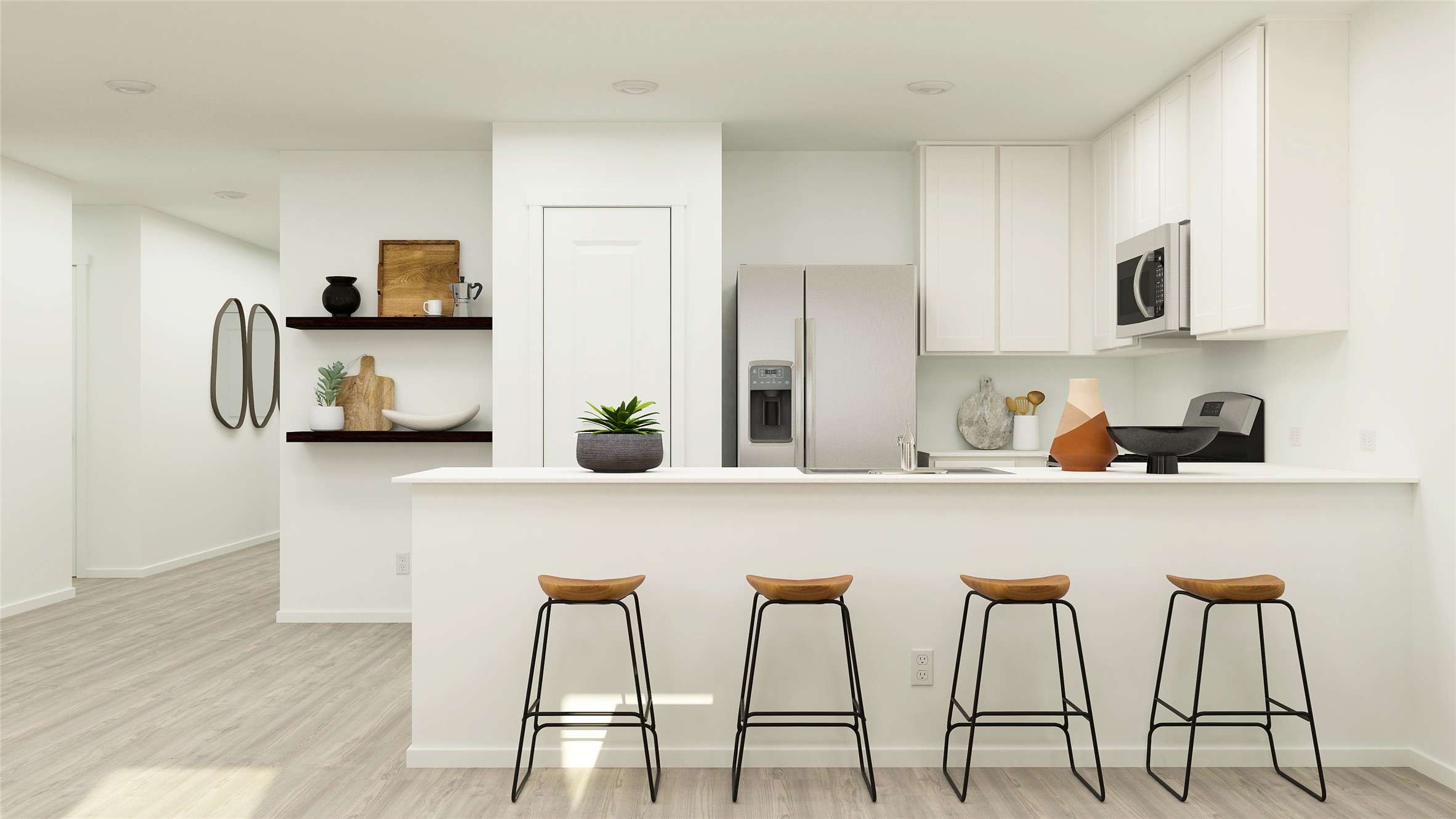 425 Silvercloud Drive Lockhart, TX 78644 - Photo 22 of 30 a white kitchen with stainless steel appliances a table and chairs in it