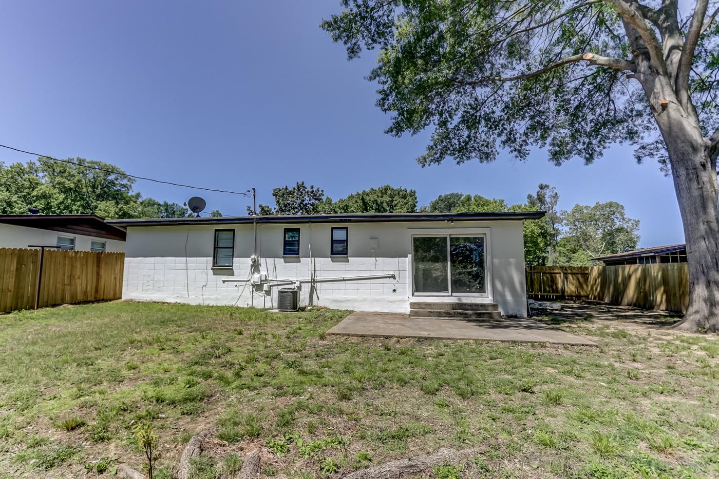 4566 Applegate Road Memphis, TN 38109 - Photo 23 of 25 a view of a house with a yard and sitting area
