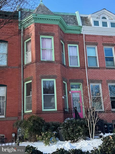 149 Kentucky Avenue Southeast Washington, DC 20003 - Photo 1 of 1 Charming brick townhouse with vibrant accents.