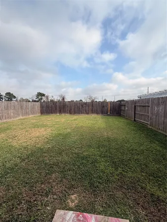a view of a big yard next to a large building