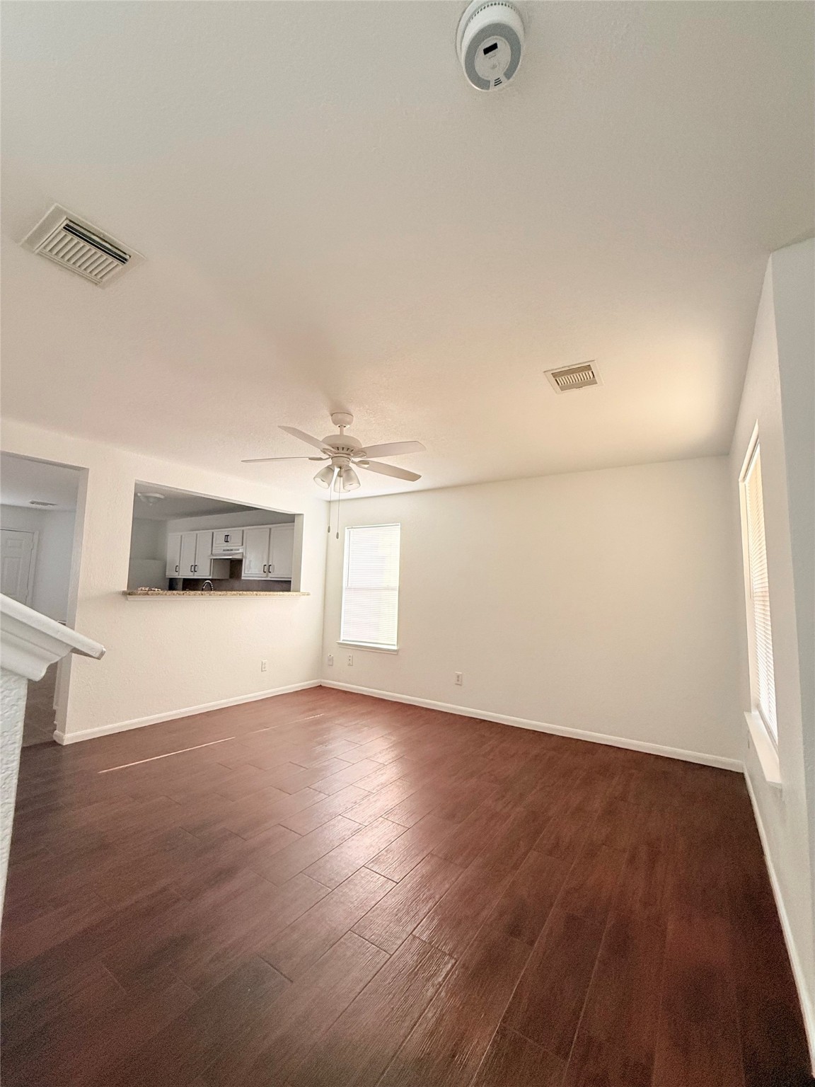 19410 Bold River Road Tomball, TX 77375 - Photo 6 of 25 an empty room with wooden floor and windows