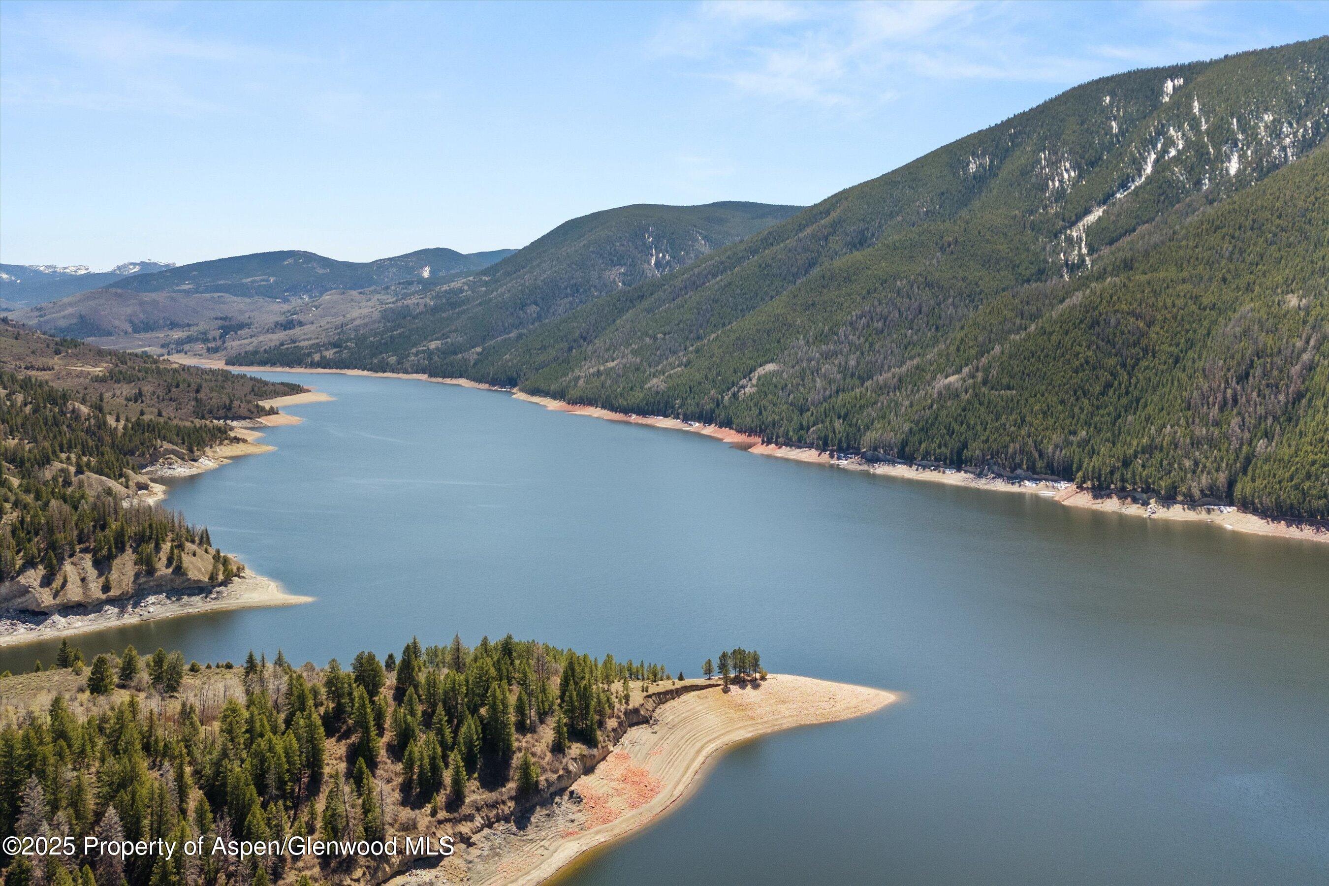 Tbd Spinnaker Lane Basalt, CO 81621 - Photo 5 of 15 a view of a lake with a mountain in the background