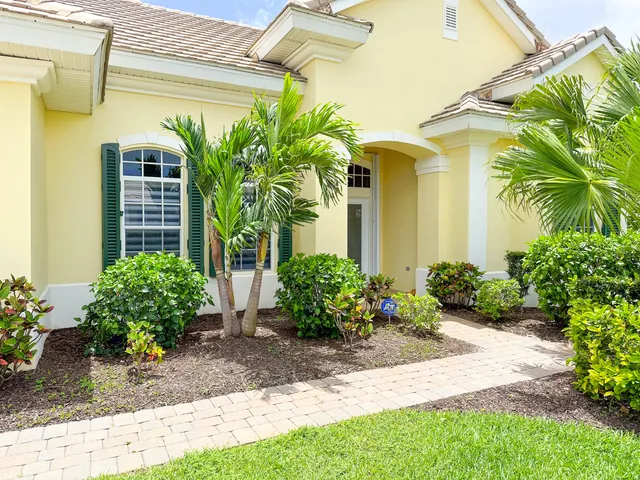 a view of a entryway door front of a house