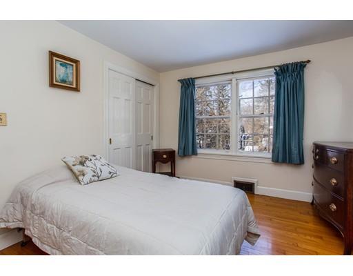 96 Roy Street Springfield, MA 01104 - Photo 17 of 27 a bedroom with a bed and a window