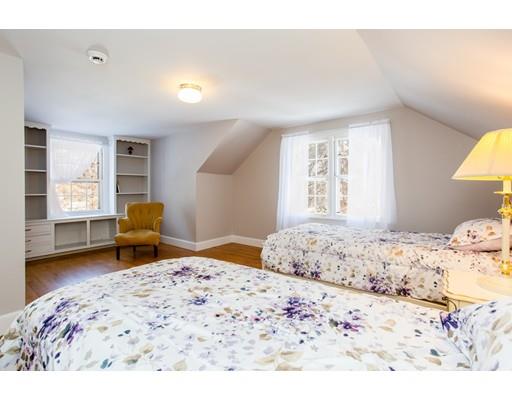 96 Roy Street Springfield, MA 01104 - Photo 18 of 27 a bedroom with a bed and a window
