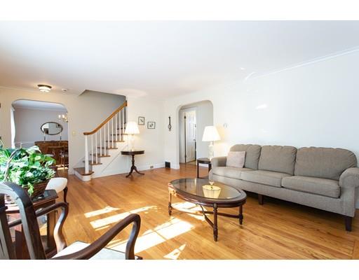 96 Roy Street Springfield, MA 01104 - Photo 6 of 27 a living room with furniture and flowers