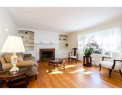96 Roy Street Springfield, MA 01104 - Photo 8 of 27 a living room with furniture and a fireplace
