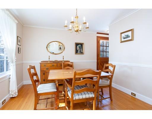 96 Roy Street Springfield, MA 01104 - Photo 9 of 27 a view of a dining room with furniture and chandelier