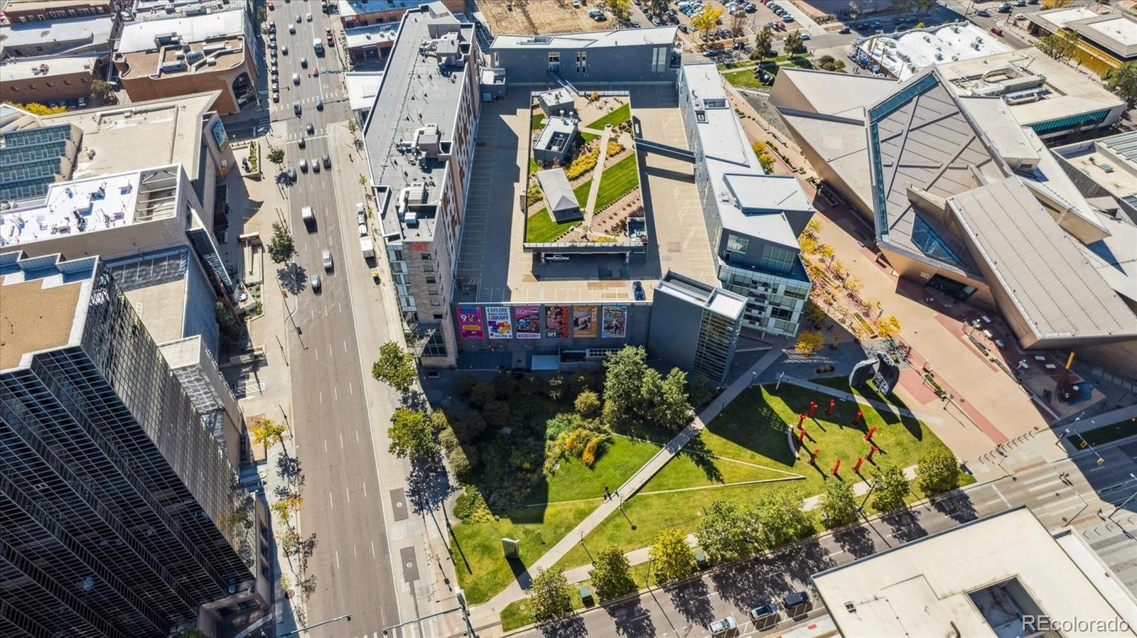 1200 Acoma Street, Unit 303 Denver, CO 80204 - Photo 28 of 48 a view of a house with a flower in a park