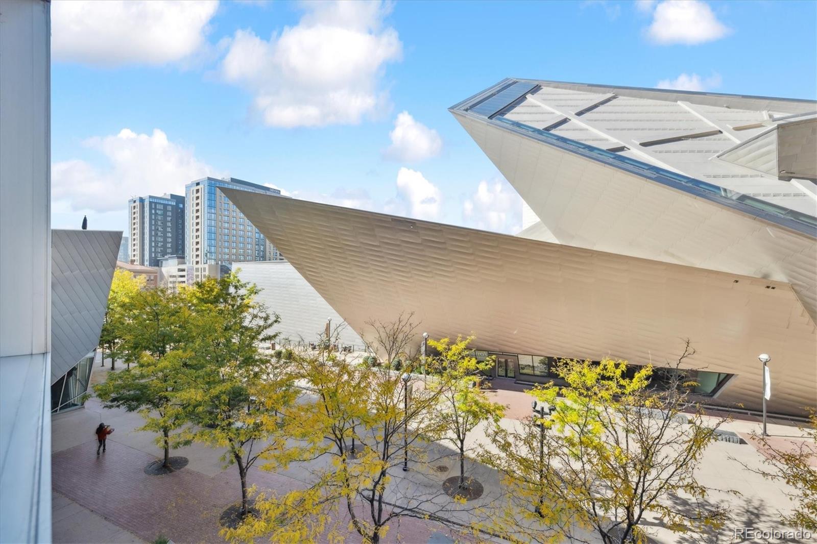 1200 Acoma Street, Unit 303 Denver, CO 80204 - Photo 33 of 48 a view of a swimming pool with a terrace