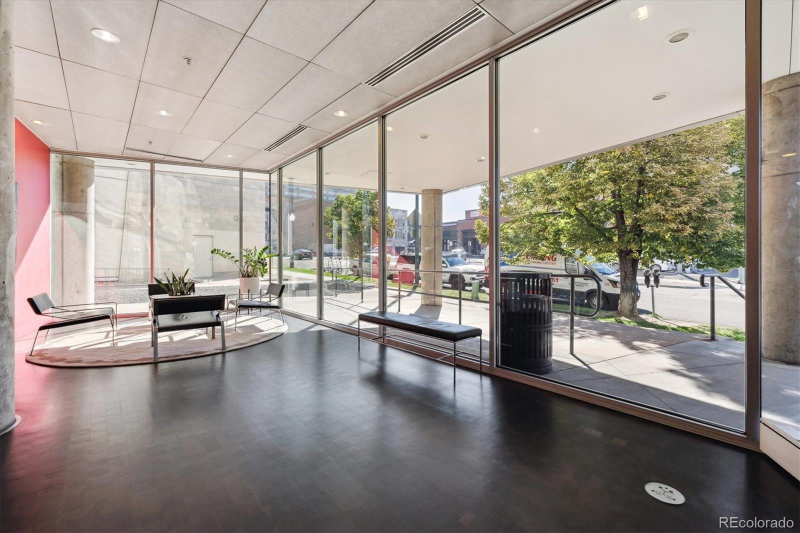 1200 Acoma Street, Unit 303 Denver, CO 80204 - Photo 34 of 48 a living room with hard wood floor