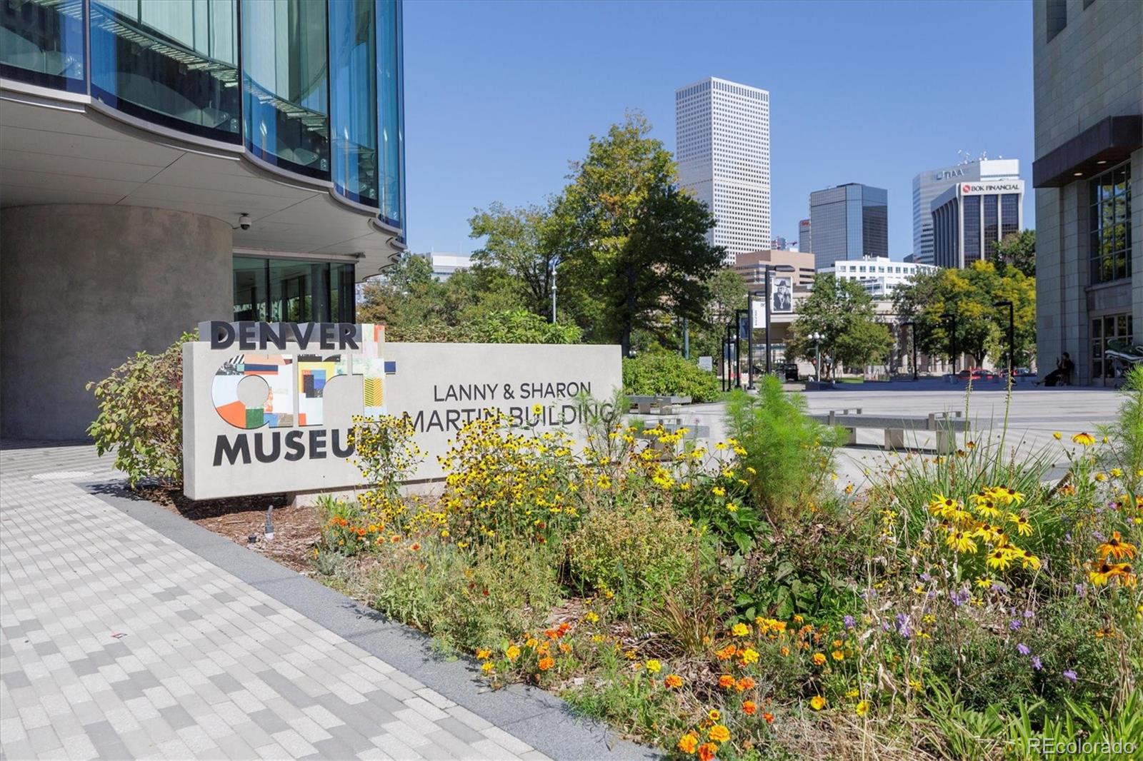 1200 Acoma Street, Unit 303 Denver, CO 80204 - Photo 42 of 48 a sign on the side of a building