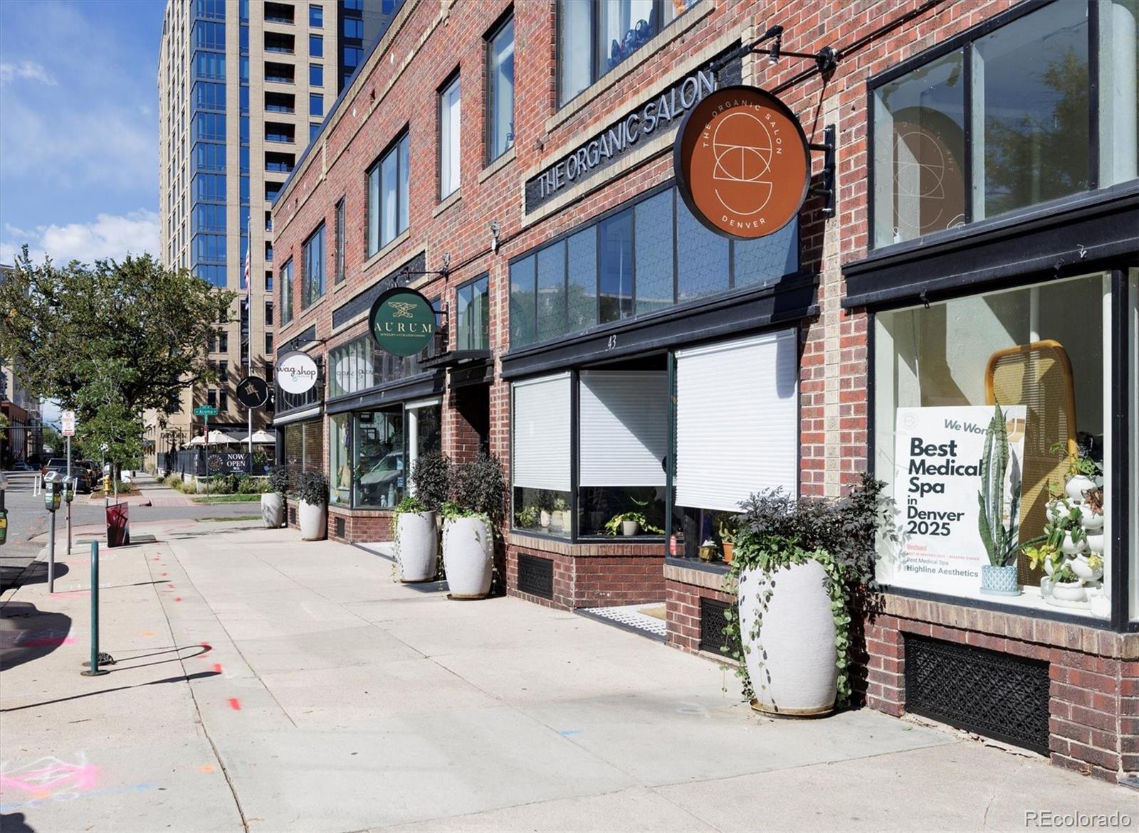 1200 Acoma Street, Unit 303 Denver, CO 80204 - Photo 46 of 48 a view of a building with a street