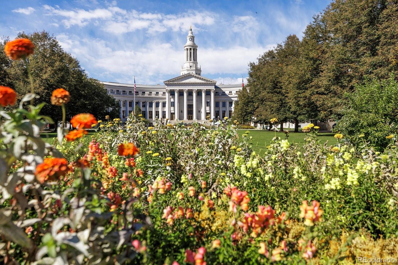 1200 Acoma Street, Unit 303 Denver, CO 80204 - Photo 48 of 48 a front view of a house with a yard