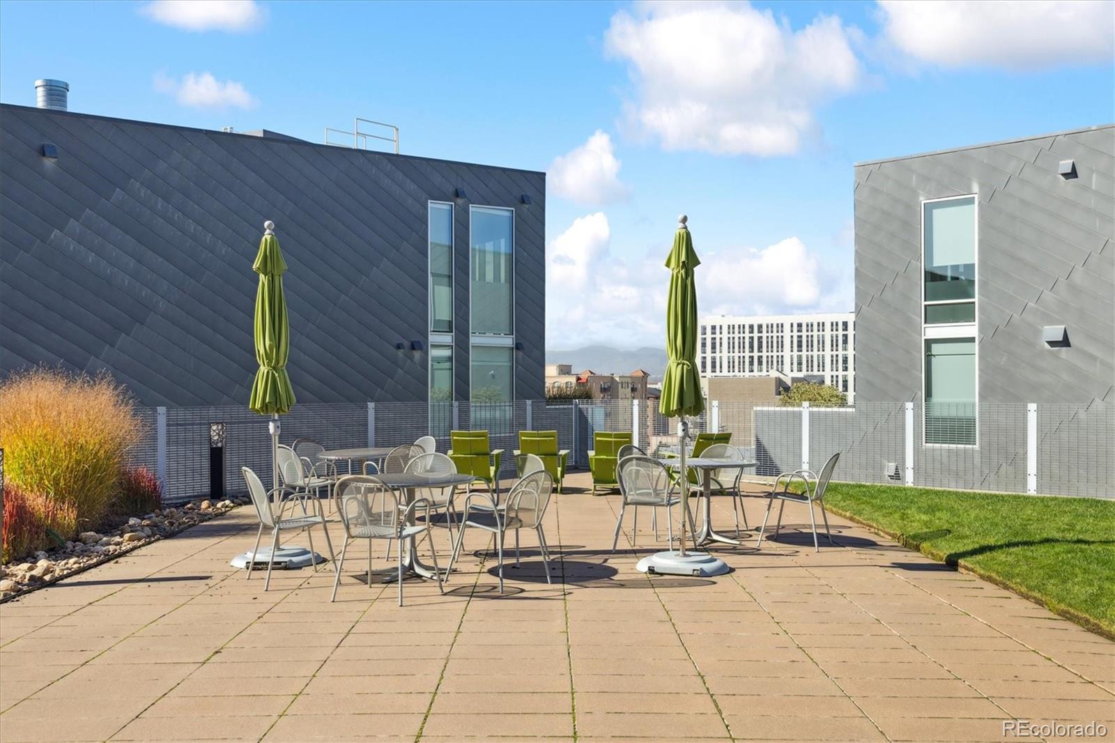 1200 Acoma Street, Unit 303 Denver, CO 80204 - Photo 6 of 48 a building outdoor space with lots of tables and chairs