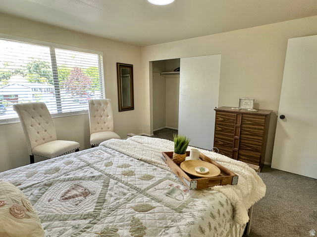 624 East Cutler Springville, UT 84663 - Photo 14 of 24 Upstairs Spacious bedroom #1 featuring light-colored walls, carpet flooring, and a window with horizontal blinds with mountain view