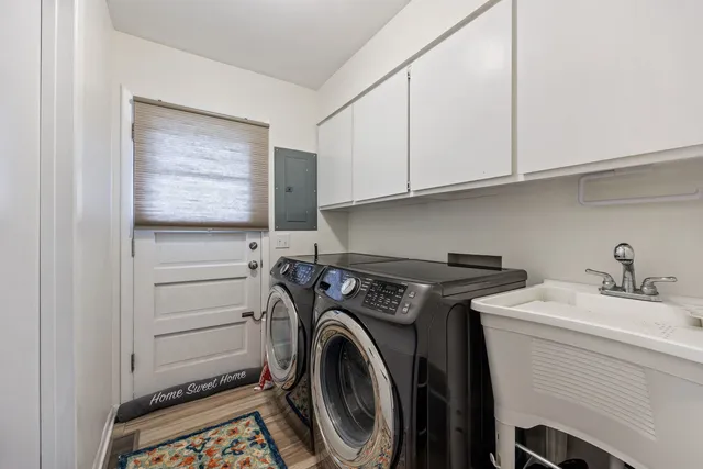 a utility room with dryer and washer