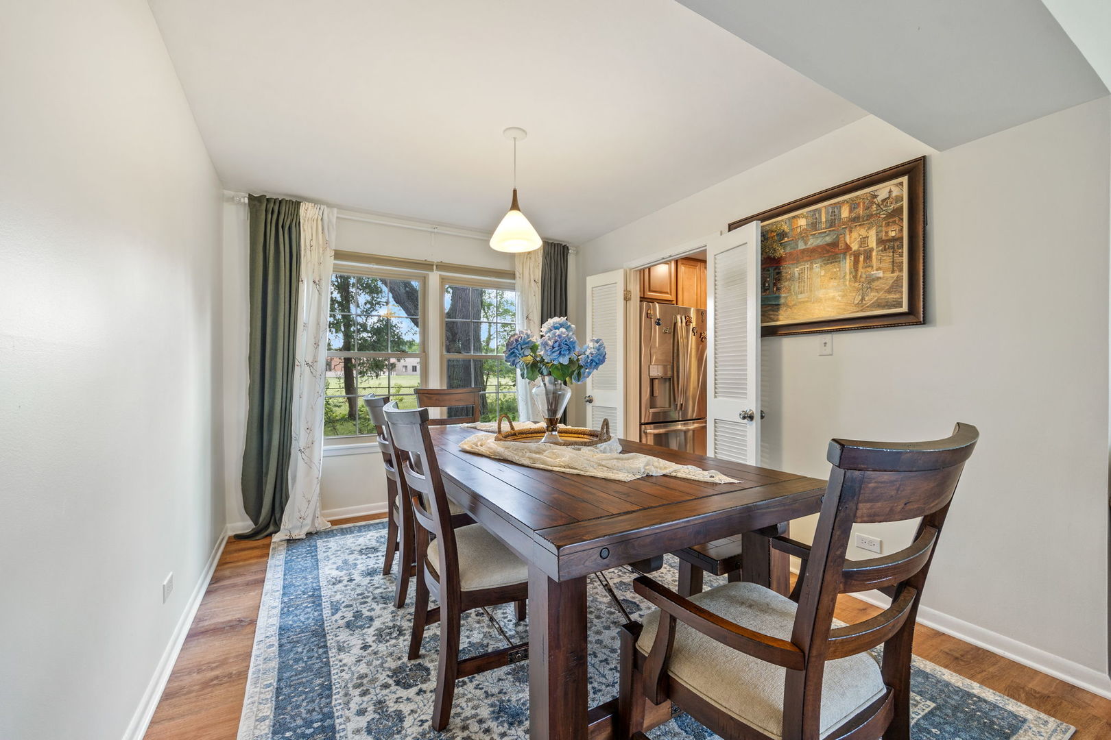 910 Lonsdale Road Elk Grove Village, IL 60007 - Photo 5 of 25 a view of a dining room with furniture window and wooden floor