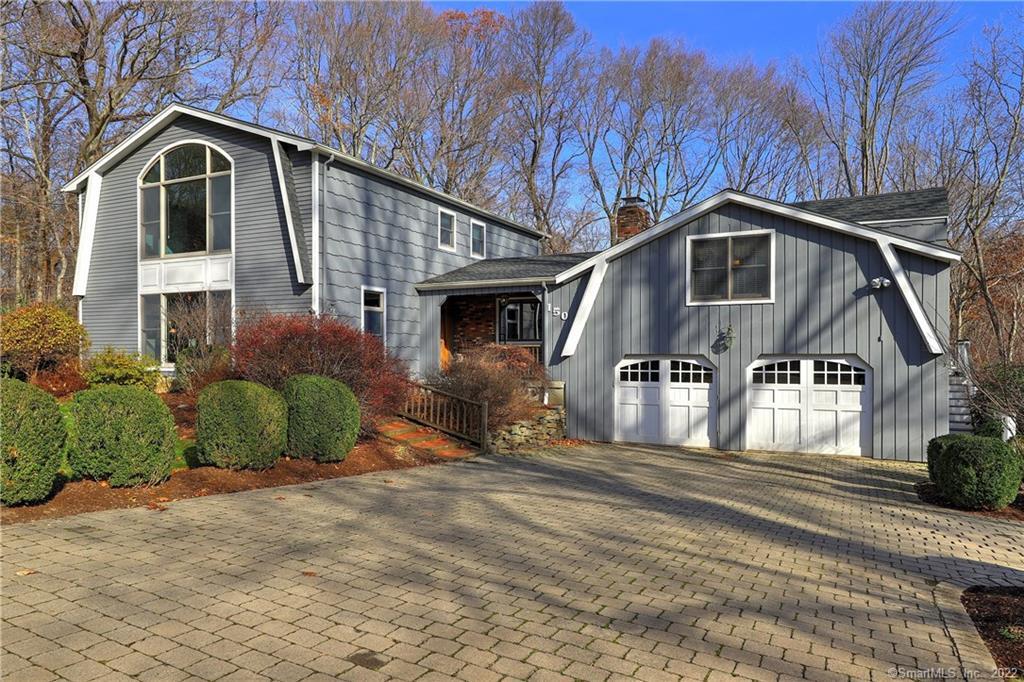 150 Tanglewood Road Stratford, CT 06614 - Photo 1 of 1 Beautiful, private setting, custom paver stone driveway and professionally landscaped entry.