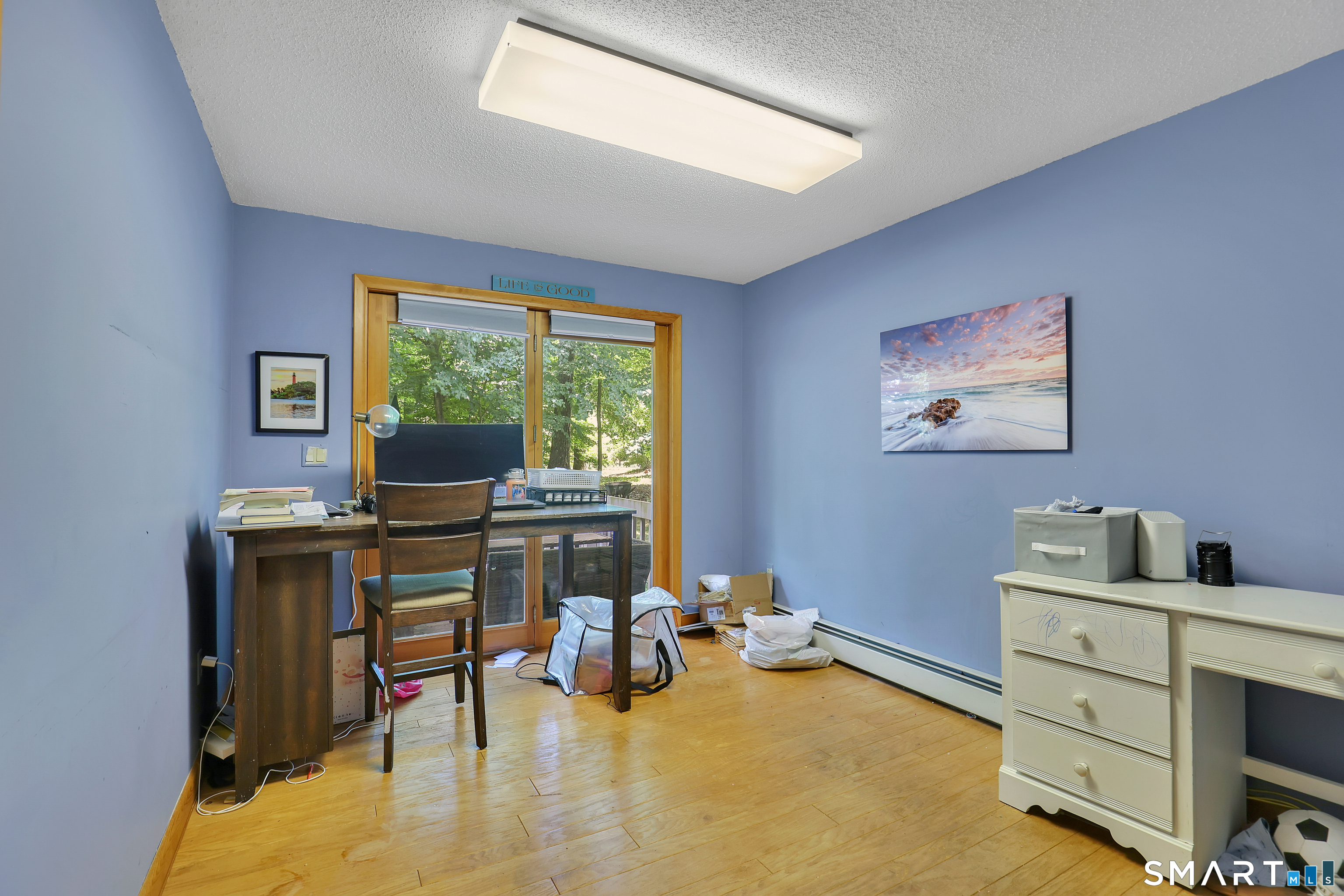 8 Pond View Road Bolton, CT 06043 - Photo 17 of 37 First floor office with french doors to the deck.