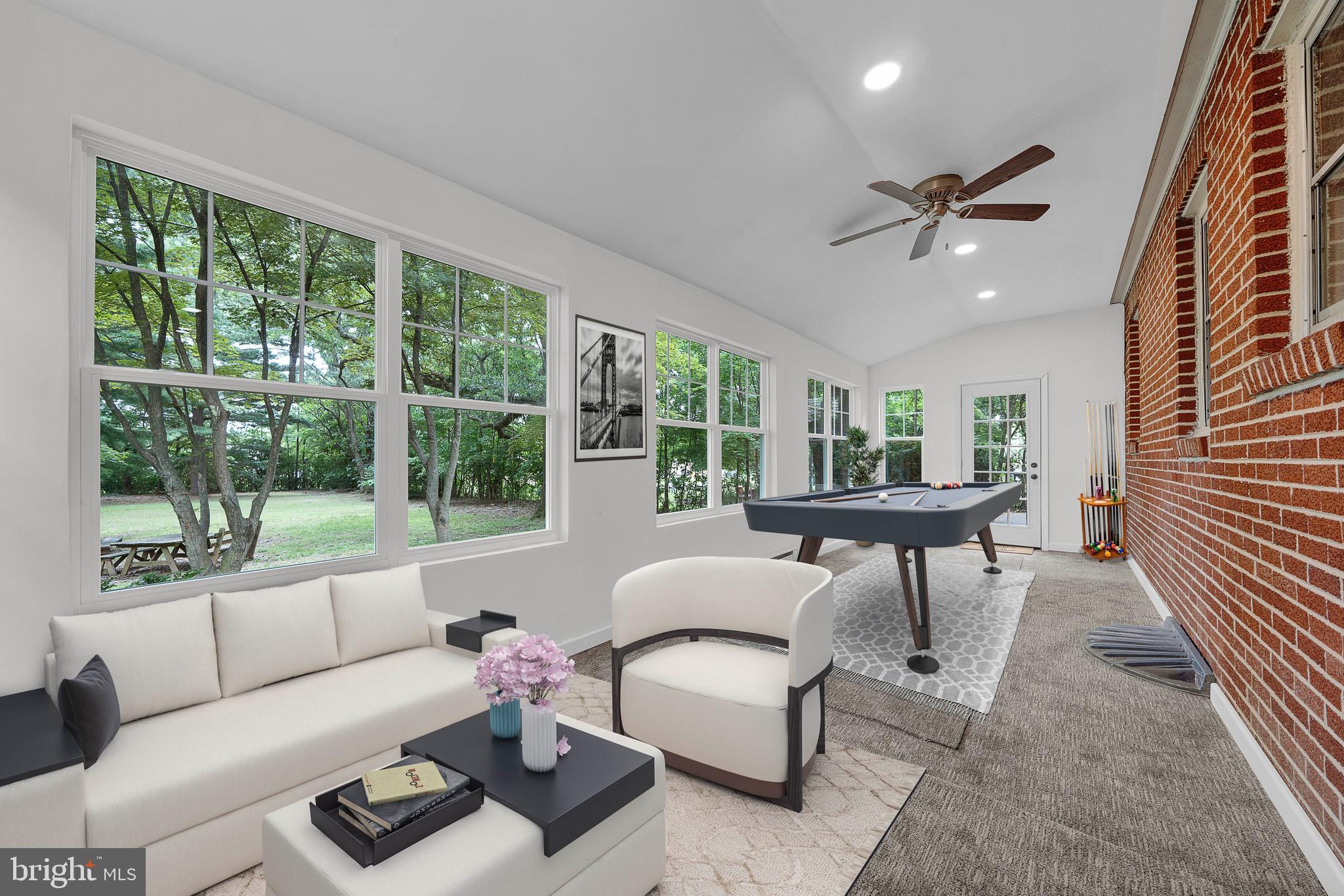 2031 Oak Road Hatfield, PA 19440 - Photo 16 of 59 a living room with furniture and a large window