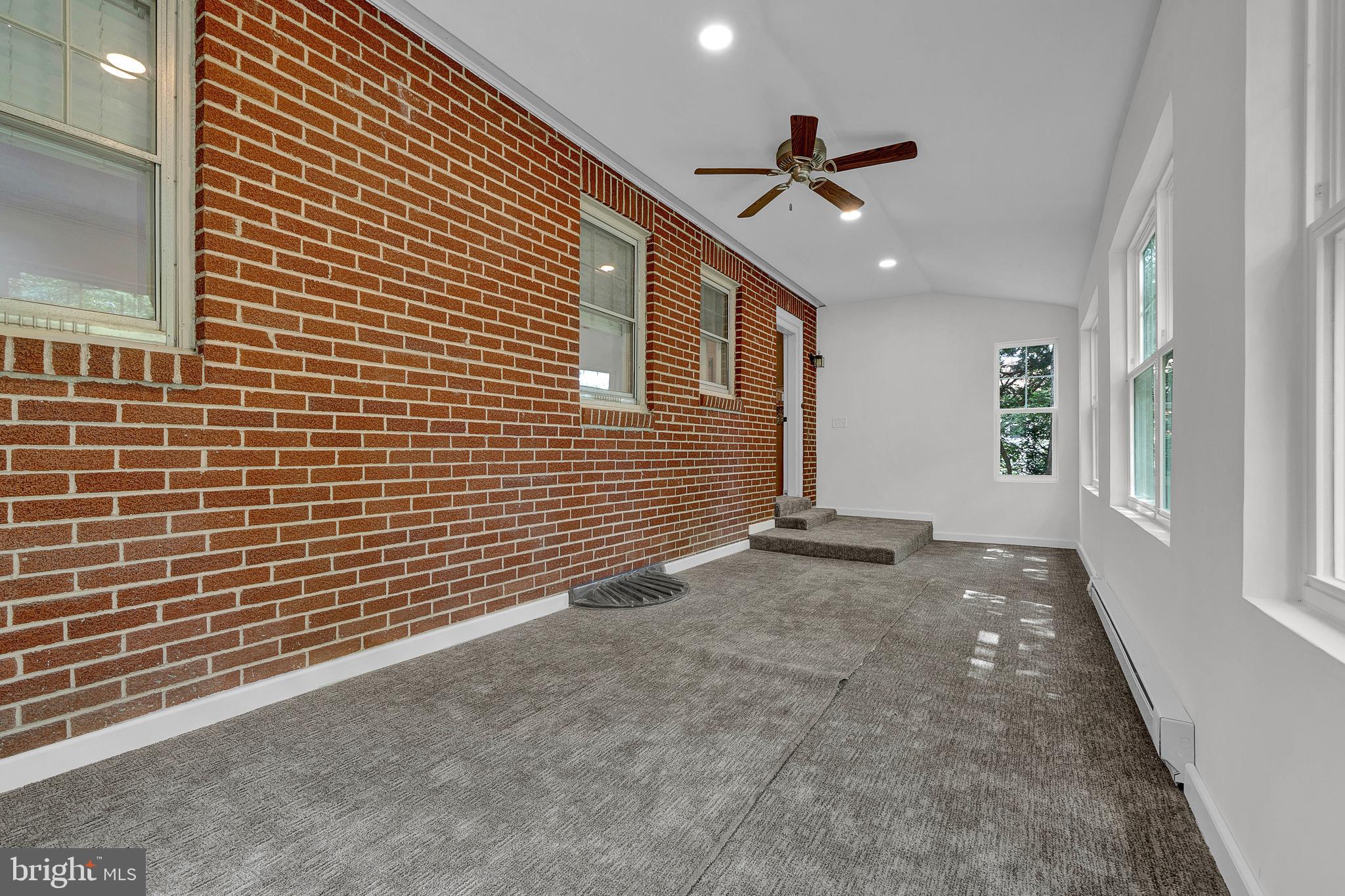 2031 Oak Road Hatfield, PA 19440 - Photo 20 of 59 a view of a livingroom with a ceiling fan and window