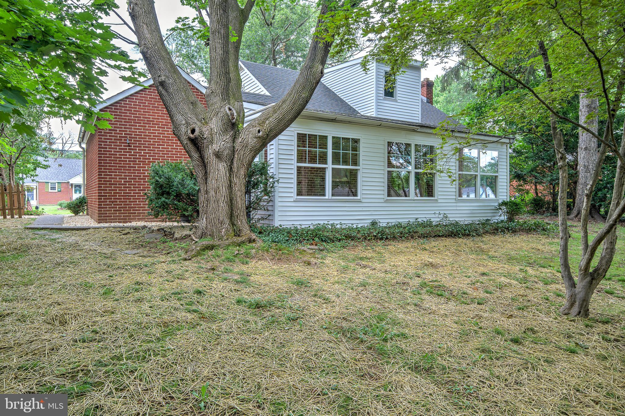 2031 Oak Road Hatfield, PA 19440 - Photo 2 of 59 a front view of a house with garden