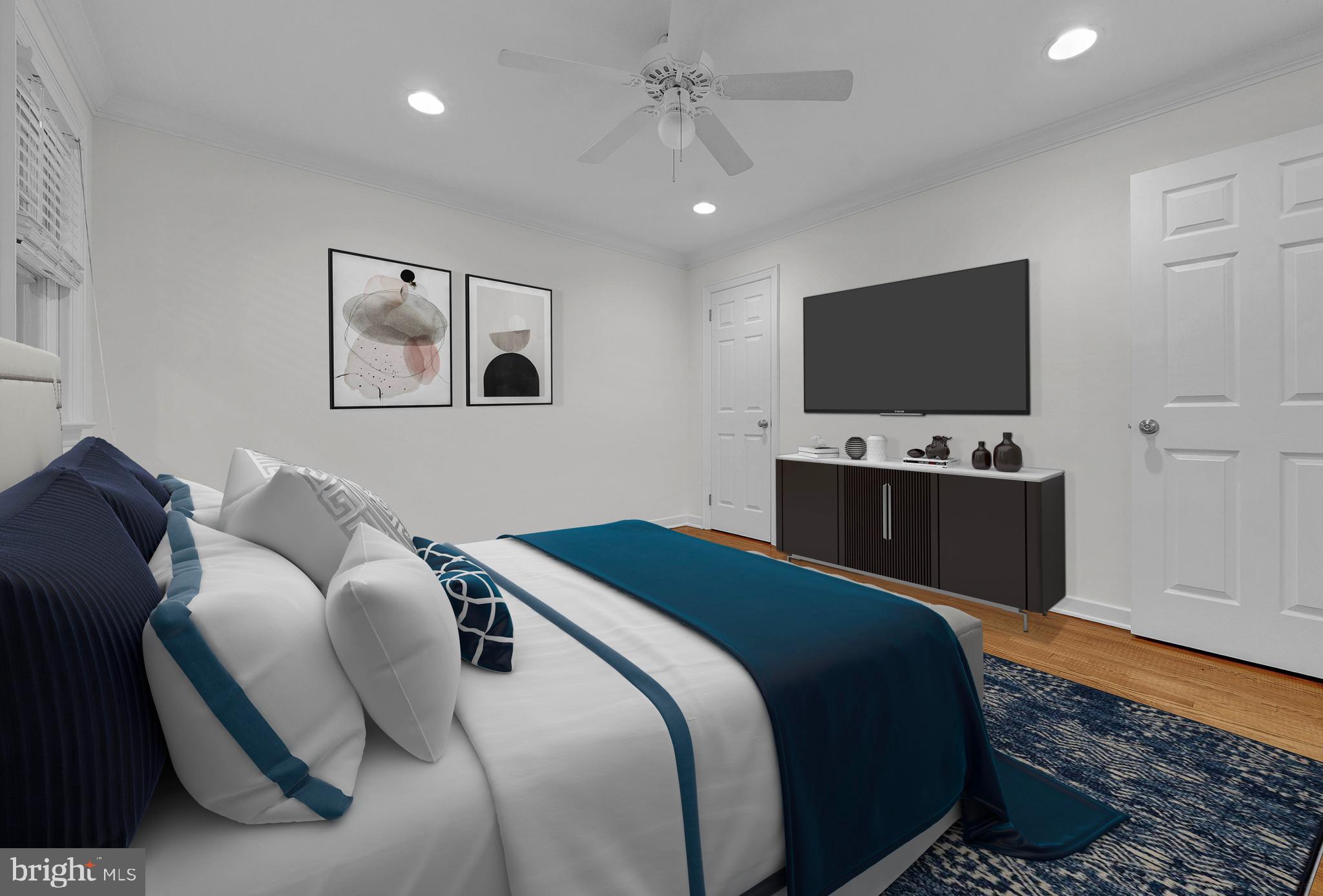 2031 Oak Road Hatfield, PA 19440 - Photo 21 of 59 a bedroom with a bed and a flat screen tv