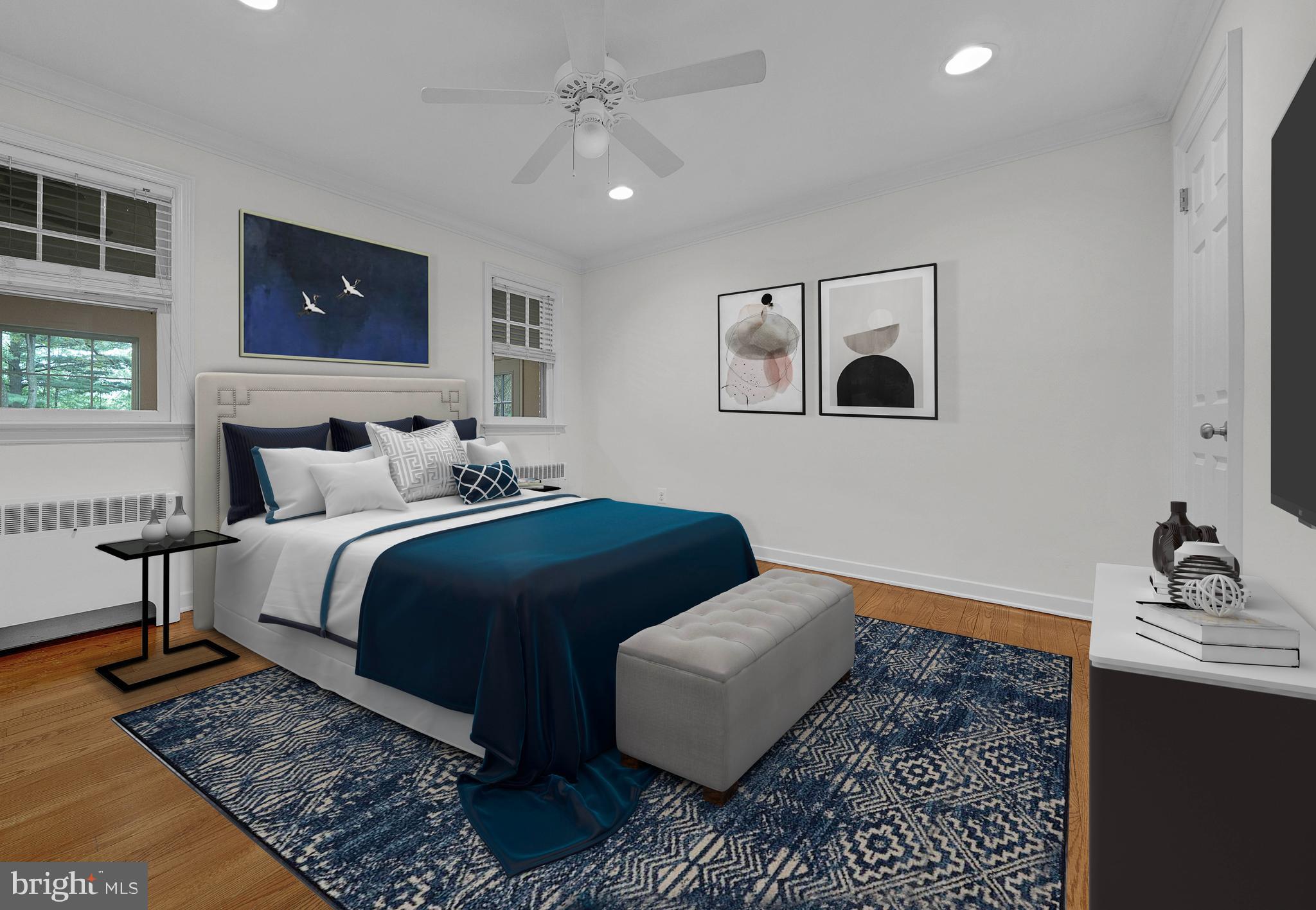 2031 Oak Road Hatfield, PA 19440 - Photo 23 of 59 a bedroom with a bed and wooden floor