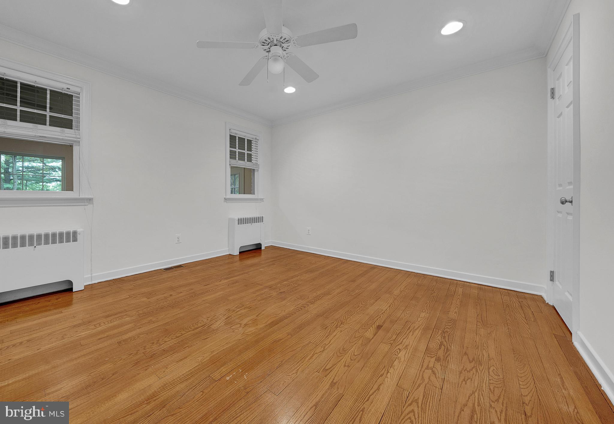 2031 Oak Road Hatfield, PA 19440 - Photo 24 of 59 a view of empty room with wooden floor and fan