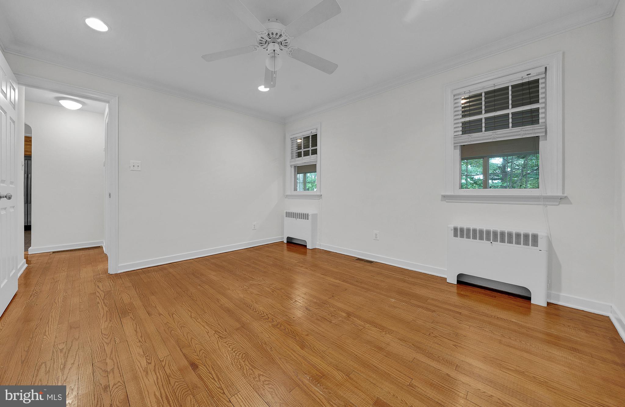 2031 Oak Road Hatfield, PA 19440 - Photo 26 of 59 a view of an empty room with wooden floor and a window