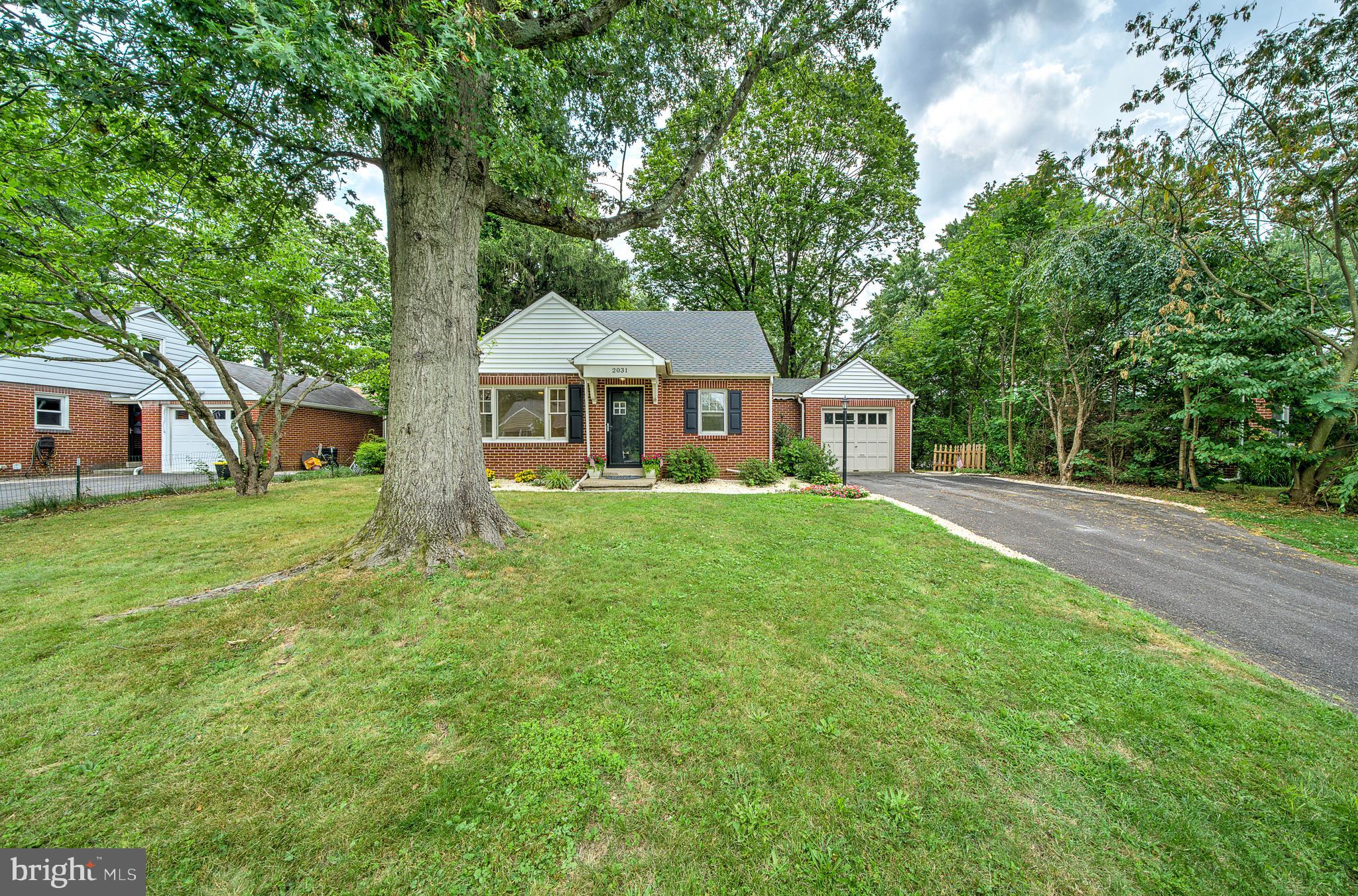 2031 Oak Road Hatfield, PA 19440 - Photo 52 of 59 a house with green field in front of it