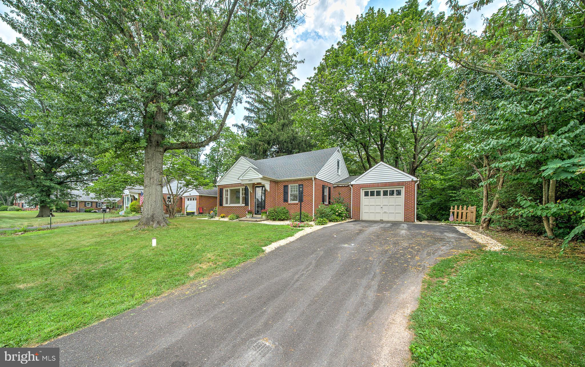 2031 Oak Road Hatfield, PA 19440 - Photo 53 of 59 a front view of a house with a garden