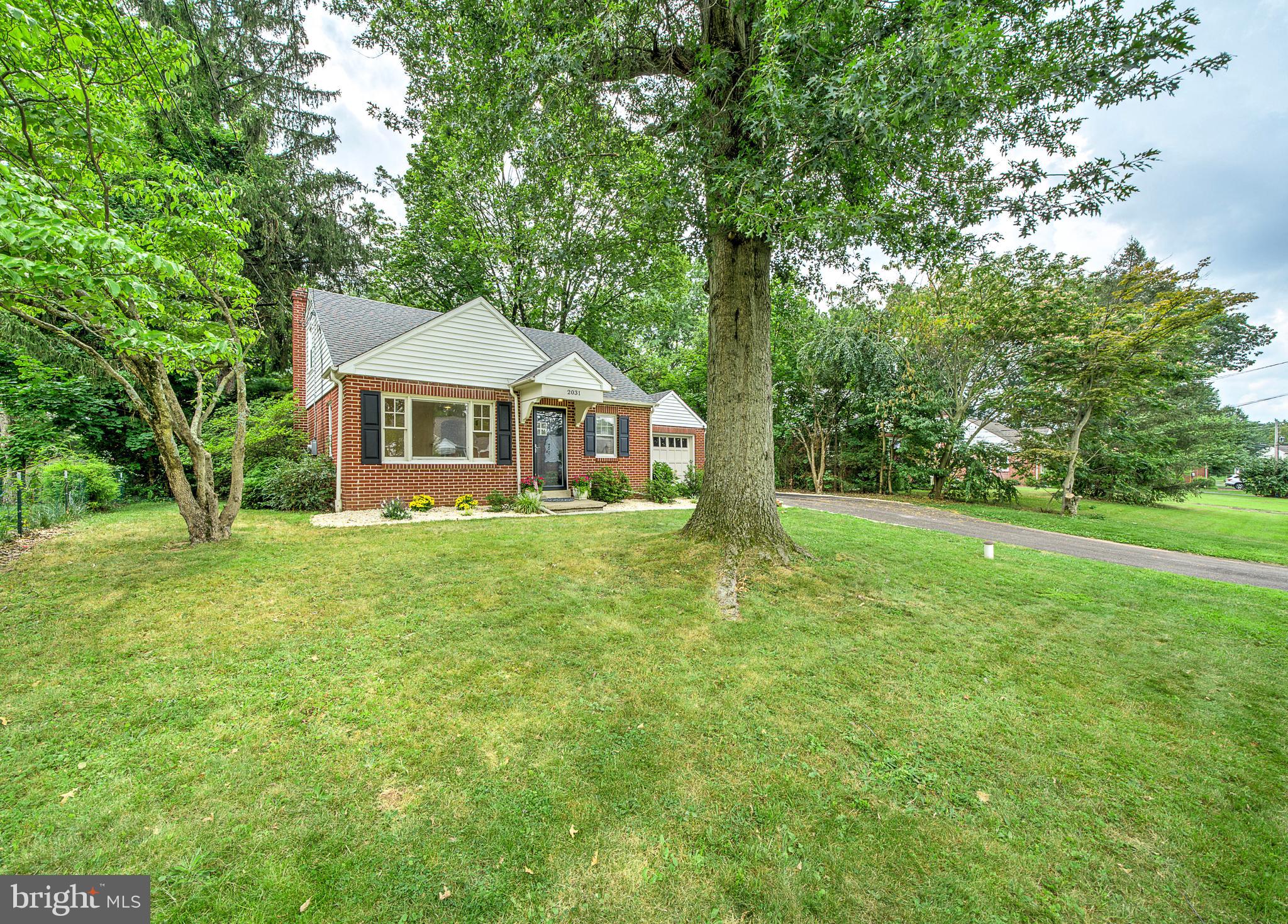 2031 Oak Road Hatfield, PA 19440 - Photo 55 of 59 a front view of a house with yard and green space