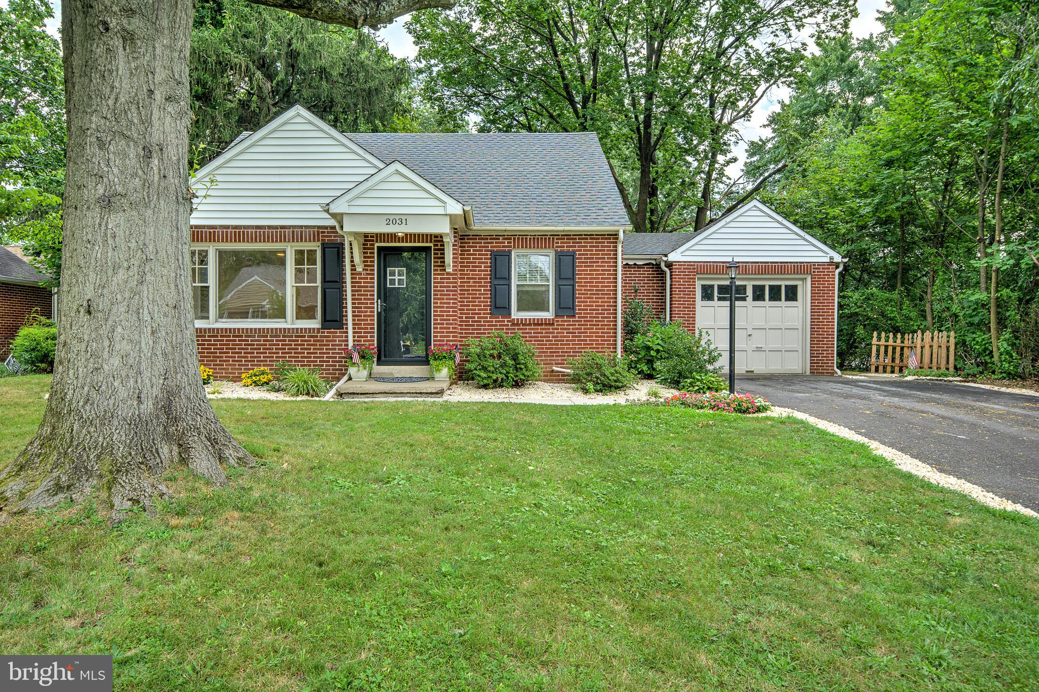 2031 Oak Road Hatfield, PA 19440 - Photo 56 of 59 a front view of a house with garden