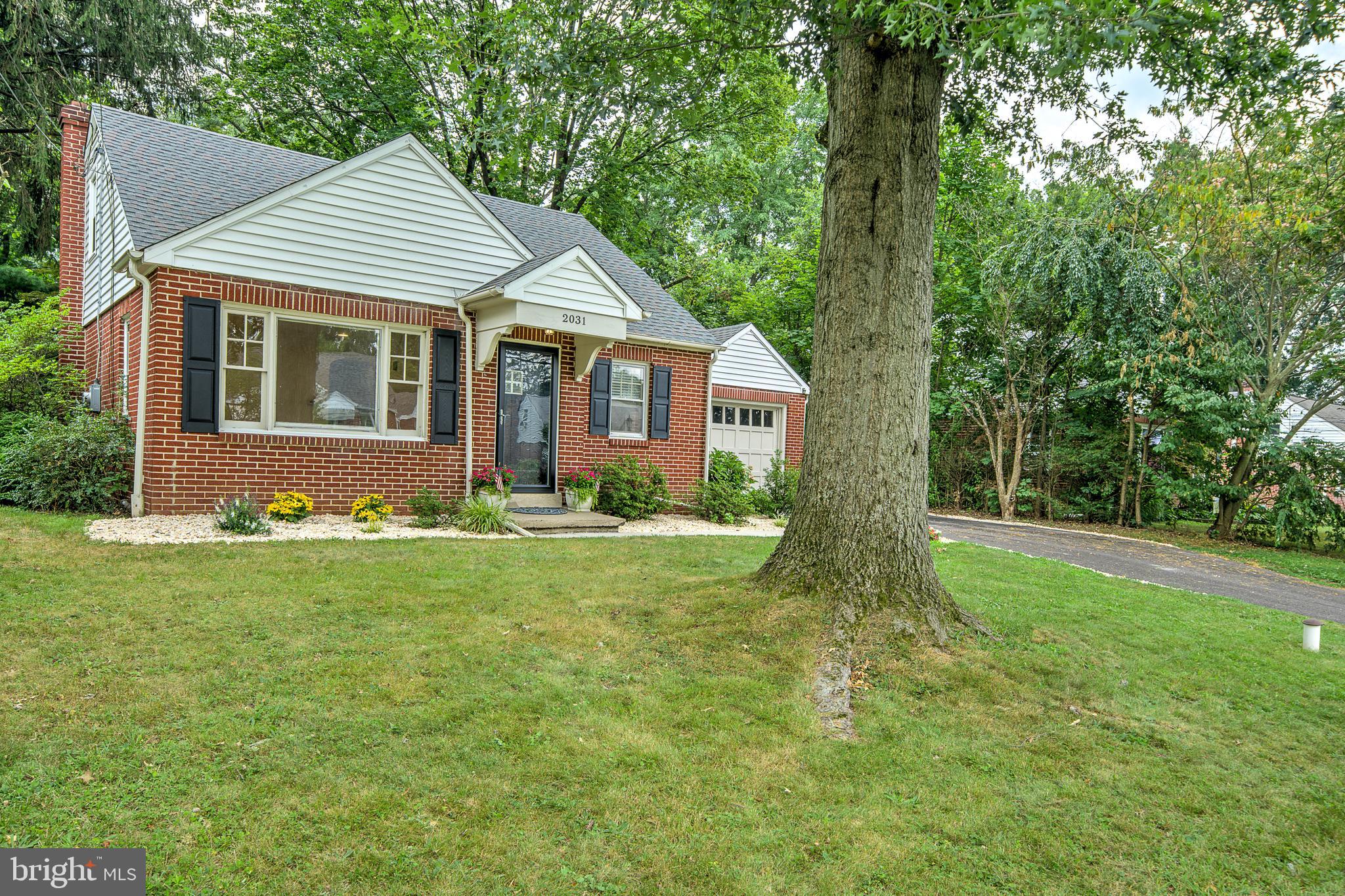 2031 Oak Road Hatfield, PA 19440 - Photo 59 of 59 a view of an house with backyard space and garden