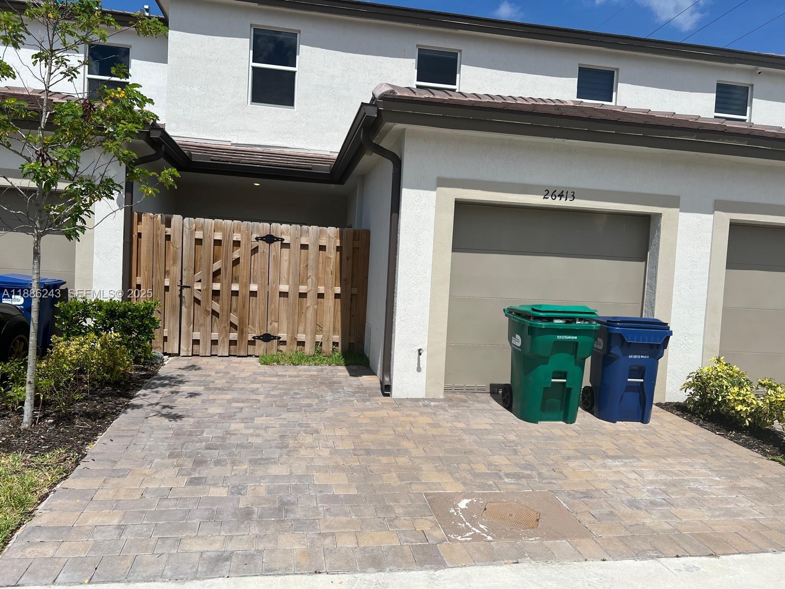 26413 Southwest 149th Avenue, Unit 26413 Homestead, FL 33032 - Photo 20 of 29 a house view with a outdoor space
