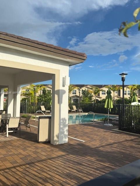 26413 Southwest 149th Avenue, Unit 26413 Homestead, FL 33032 - Photo 24 of 29 a view of a living room and floor to ceiling window