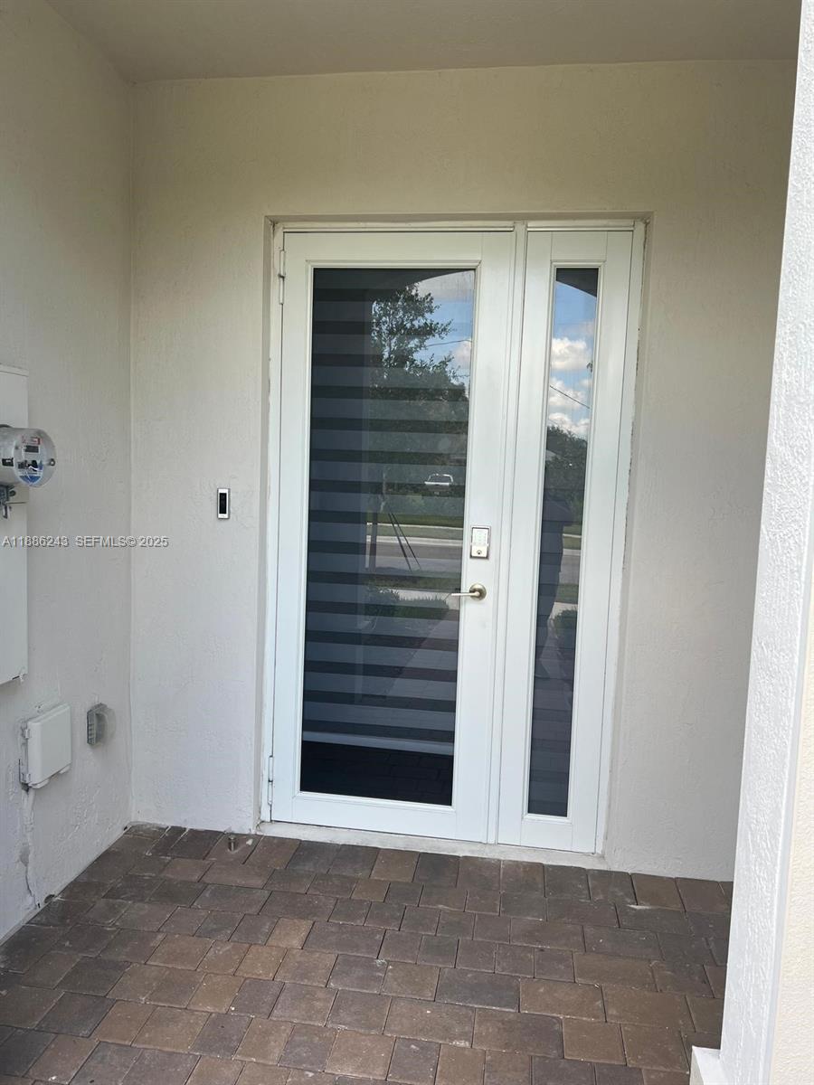 26413 Southwest 149th Avenue, Unit 26413 Homestead, FL 33032 - Photo 3 of 29 a view of entryway
