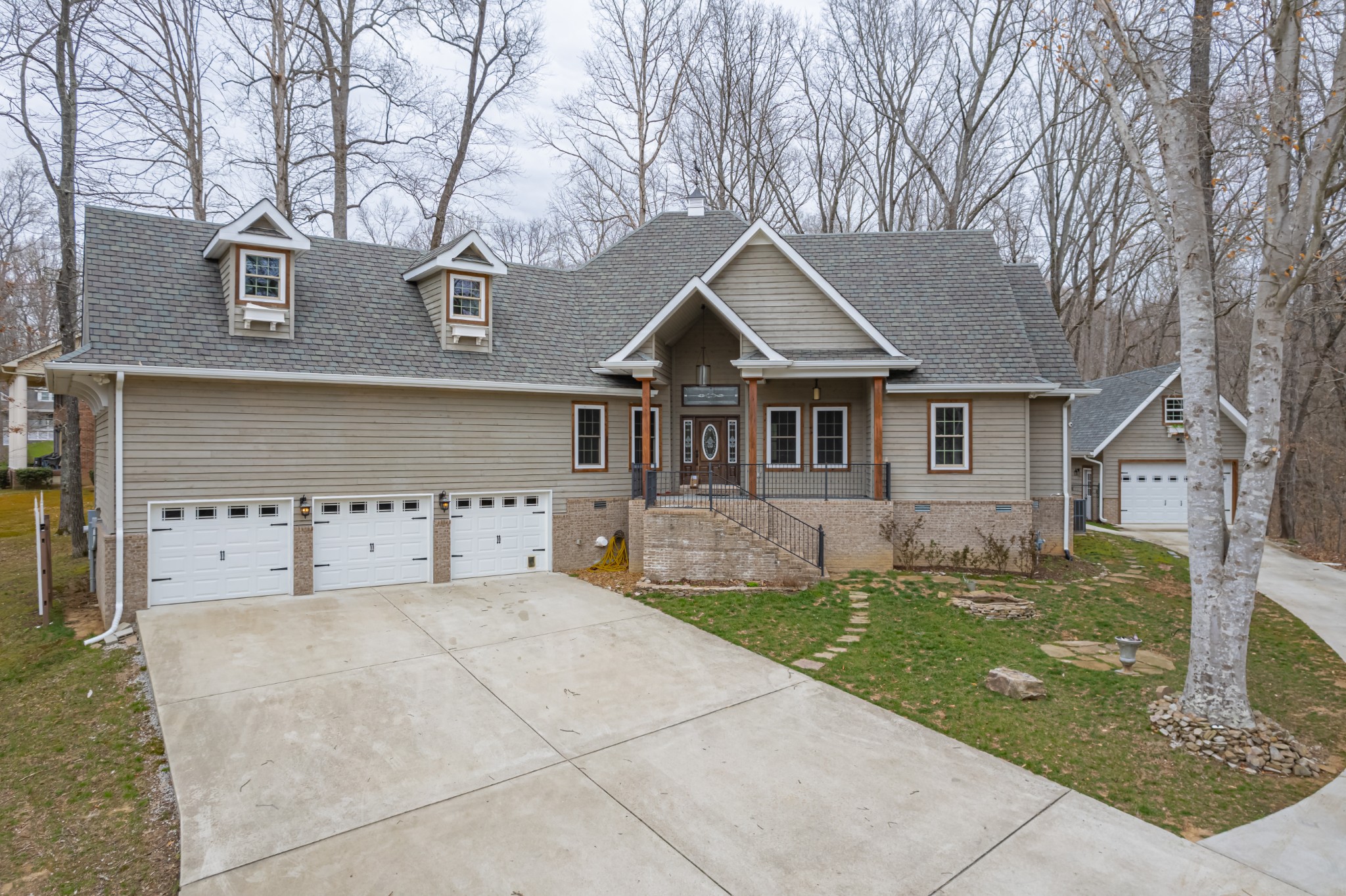 front view of a house with a yard
