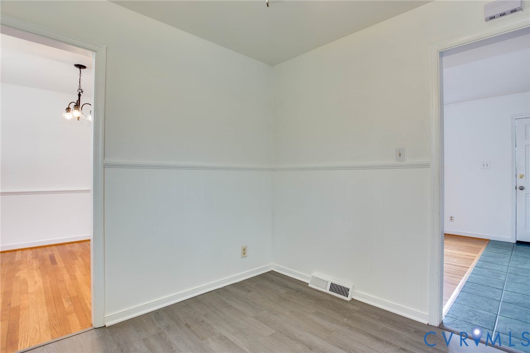 3909 Longleaf Drive Henrico, VA 23294 - Photo 12 of 39 Spare room featuring wood finished floors and a ch