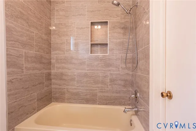 a bathroom with a bathtub