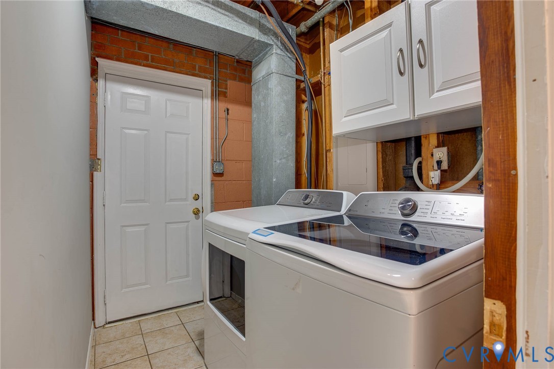 3909 Longleaf Drive Henrico, VA 23294 - Photo 32 of 39 Laundry area featuring cabinet space, washer and c