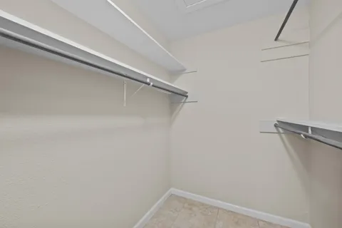 a view of a backyard with a table and chair