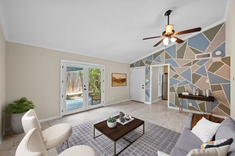 a living room with furniture and a window