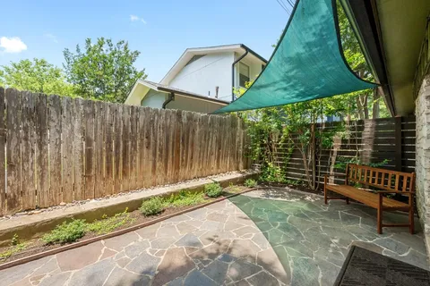 a view of a back yard of the house