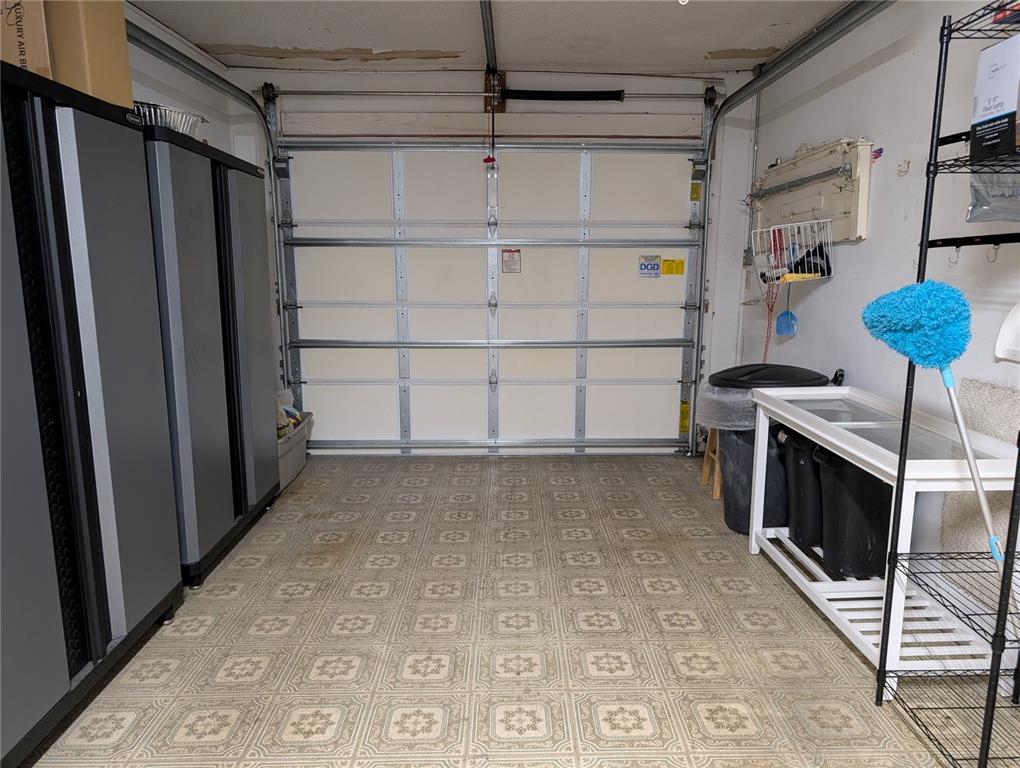 8161 Braddock Circle, Unit 1 Port Richey, FL 34668 - Photo 24 of 27 a view of storage and utility room