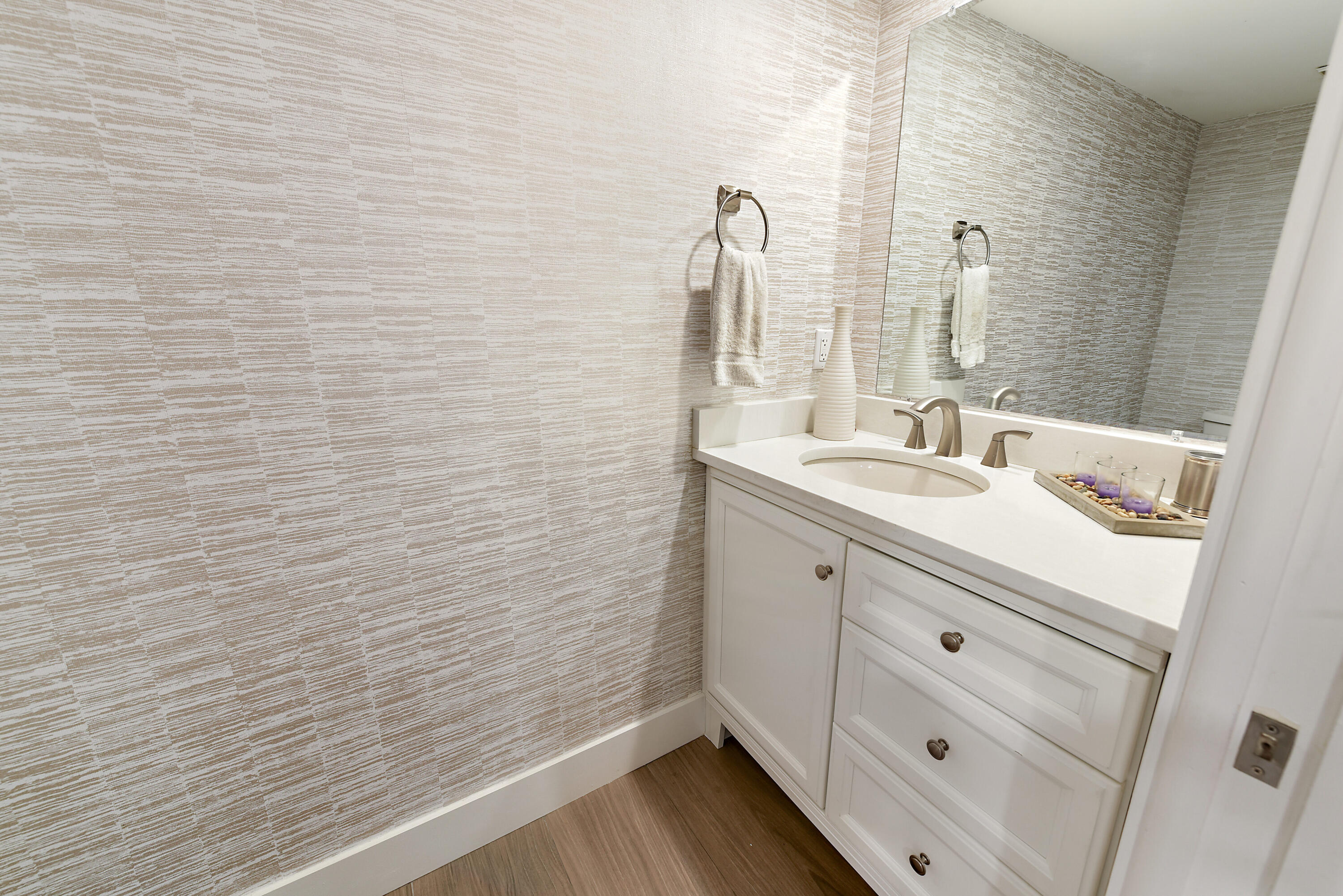 7369 Orangewood Lane, Unit 301 Boca Raton, FL 33433 - Photo 12 of 53 a bathroom with a sink and a mirror